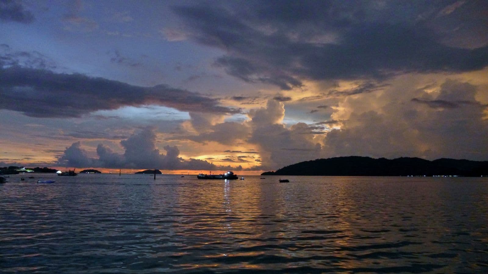 Gaya Island at sunset from Kota Kinabalu waterfront